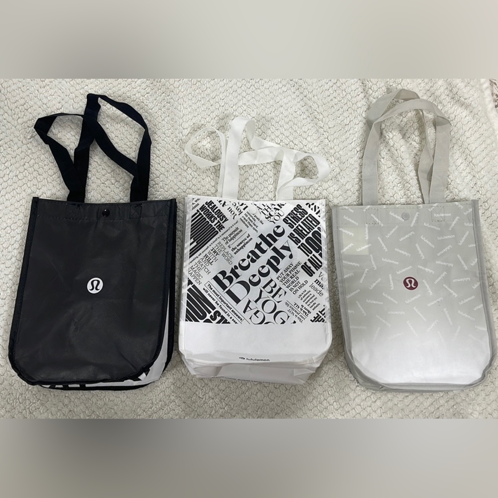 Lululemon Athletica shopping bags. All 3 sold together, not separately.
